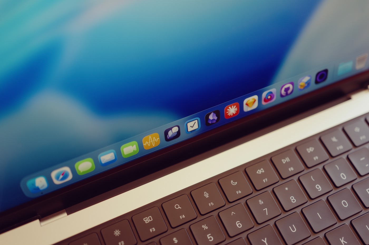 MacBook Pro photo with a focus on the Dock.